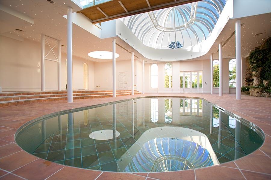 moving floor swimming pool reflecting conservatory roof