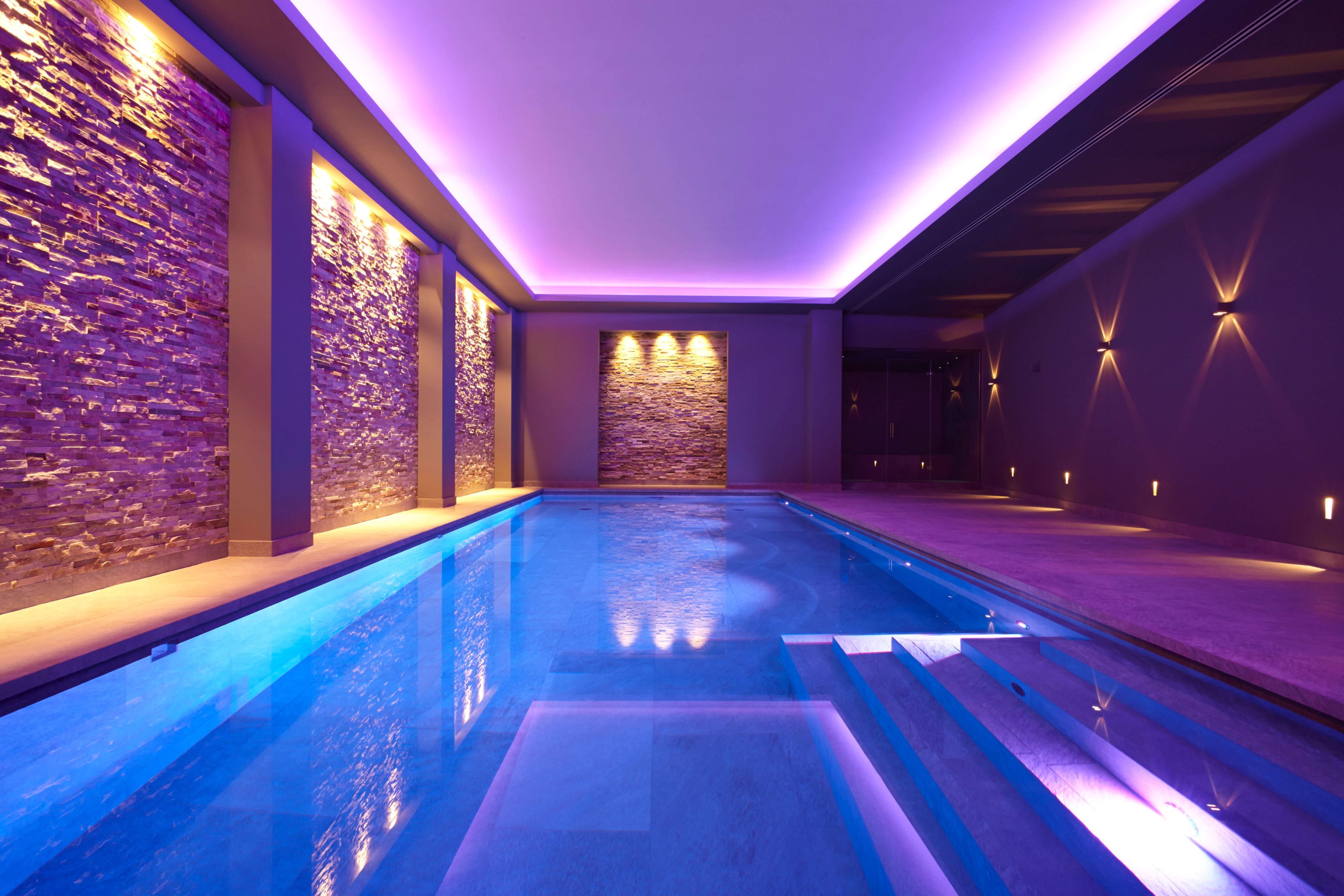 Basement pool lighting, designed and built by Guncast