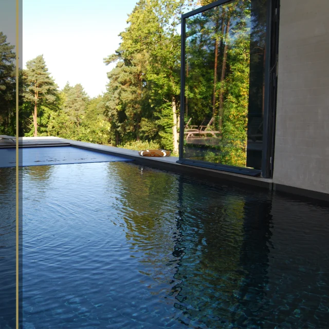 Enjoy the best of both world’s with an in and out swimming pool.

This bespoke Guncast swimming pool can be enjoyed all year round due to it’s half inside and half outside design. Ingeniously crafted glass doors can close to create a cozy indoor pool during colder months, or open to form a seamless, expansive pool for the rest of the year.

Positioned to maximize breathtaking views of the surrounding woodland, this pool is truly unique and special,

#InAndOutSwimmingPool #IndoorSwimmingPool #OutdoorSwimmingPool  #IndoorPool #OutdoorPool #WinterPool #SummerPool #Guncast